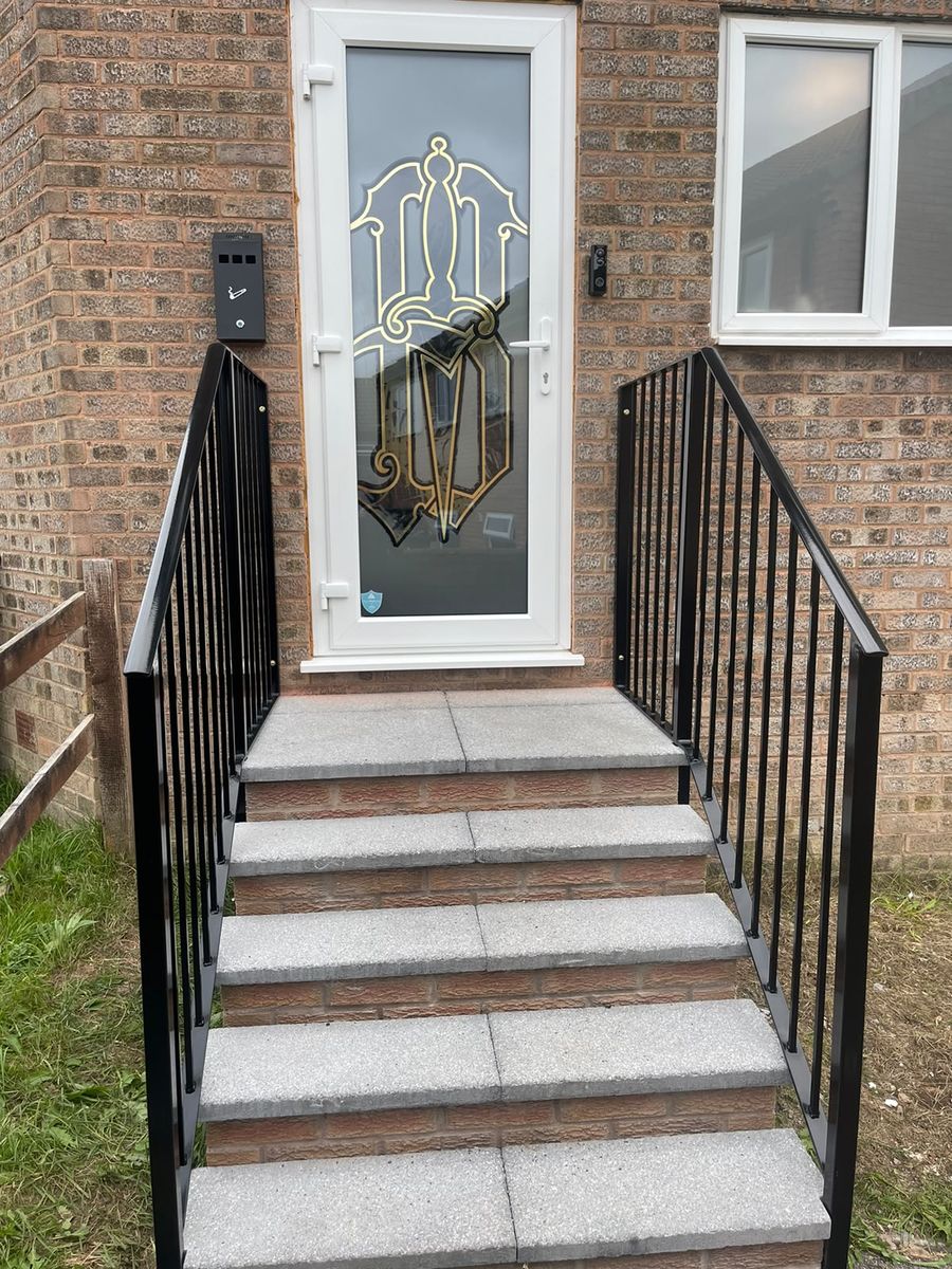 Black Dagger Tattoo studio entrance with etched glass crest